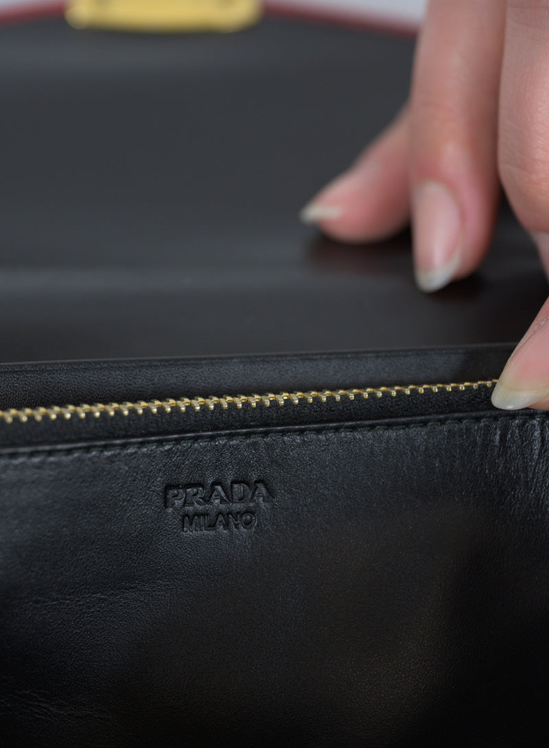 Prada Pochette in pelle Saffiano rossa