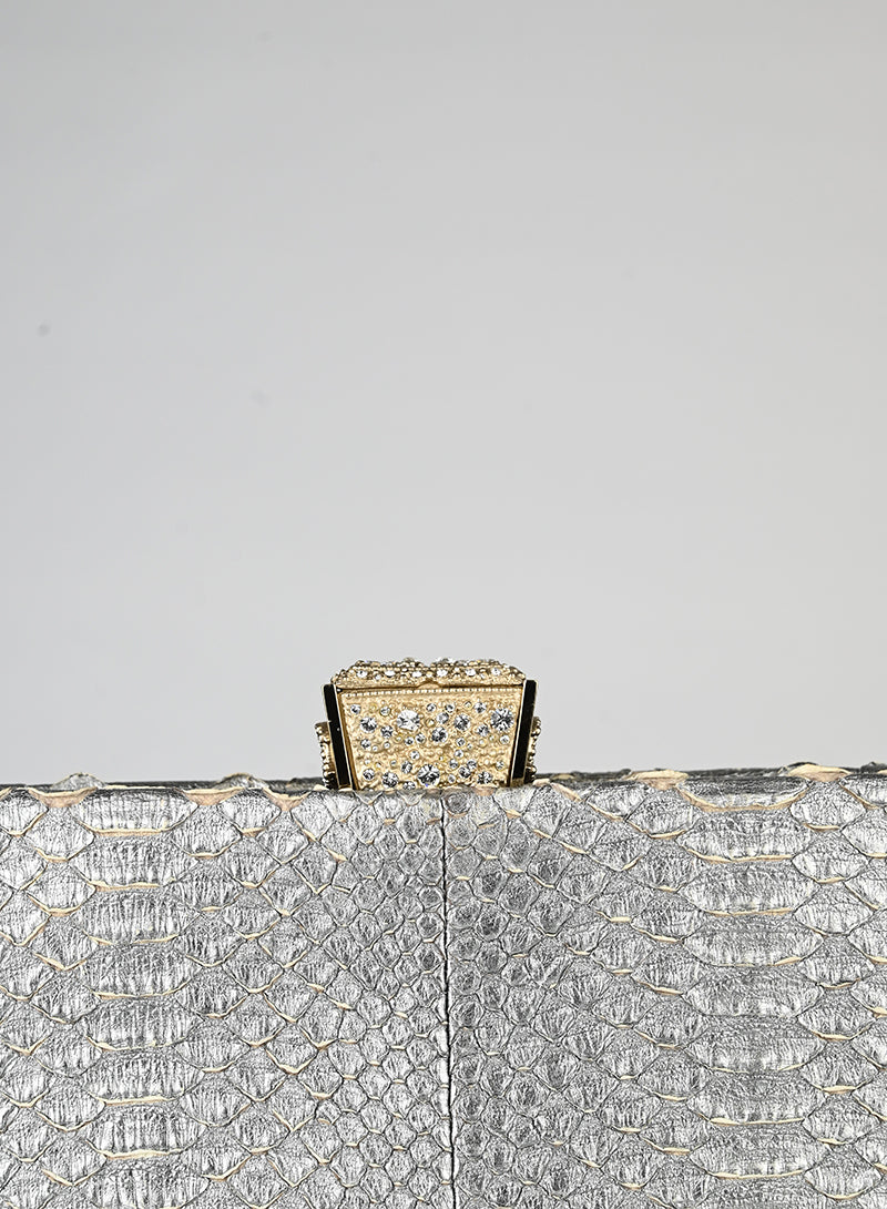 Chanel Pochette in pelle pitone argento