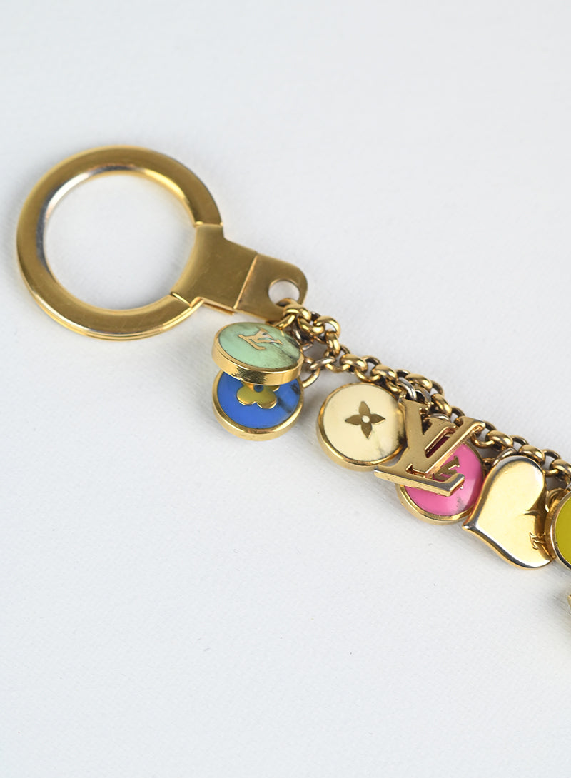 Louis Vuitton Trick con catena oro