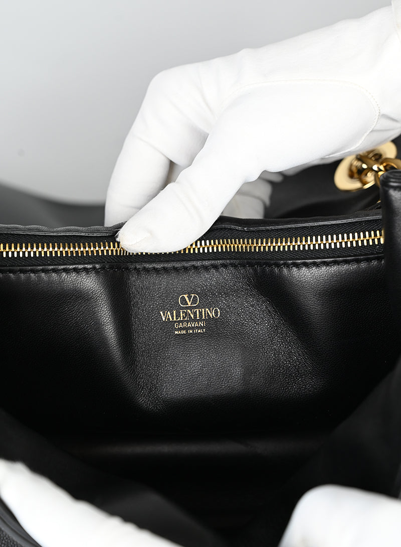 Valentino Borsa in pelle nera con V