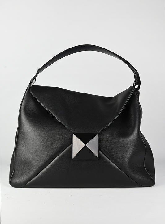 Valentino Borsa in pelle nera con maxi stud
