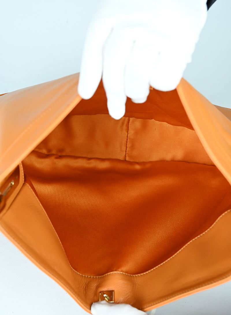 Versace Borsa semi hobo in pelle arancio - lesleyluxuryvintage