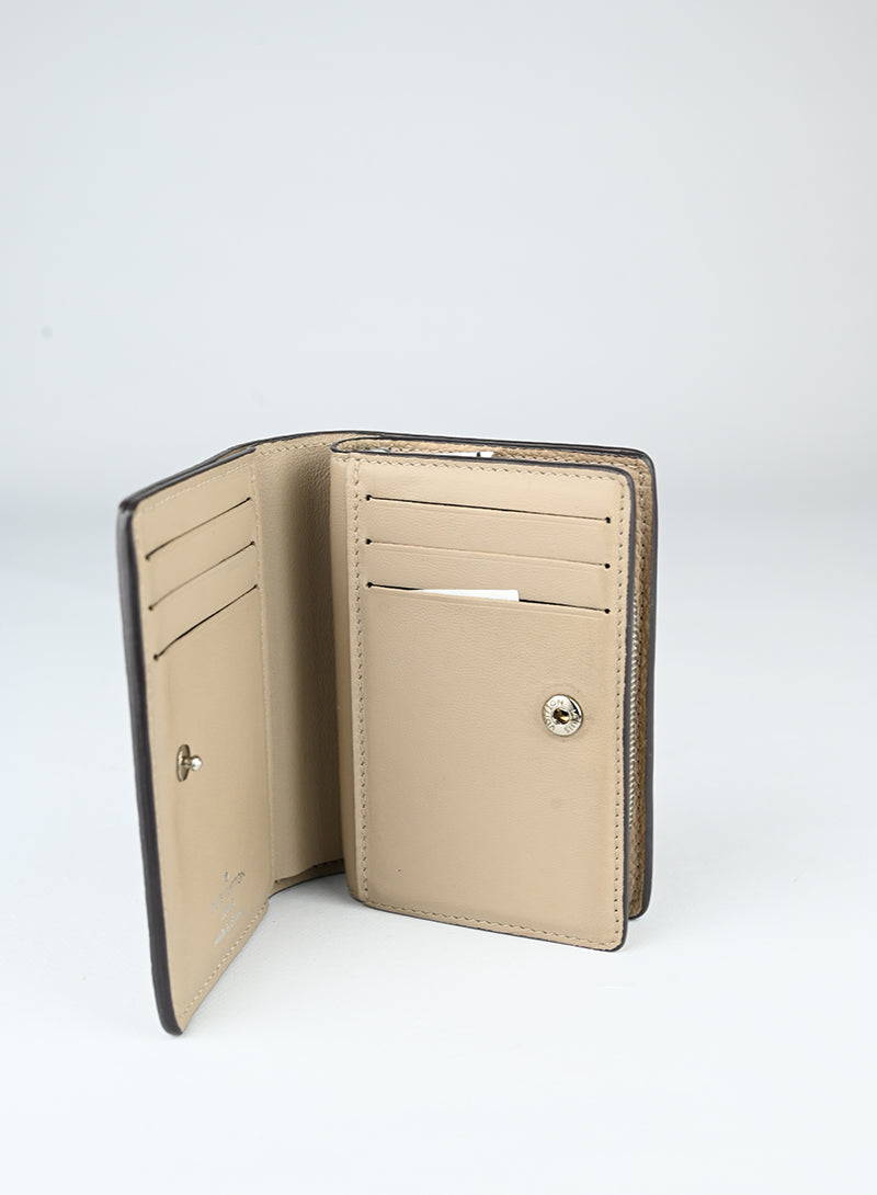 Louis Vuitton Portafogli in pelle beige LV