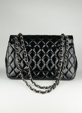 Load image into Gallery viewer, Chanel Jumbo bag in black vernis
