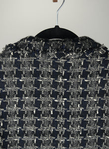 Chanel Gray and black bouclé jacket - Size. 46