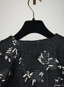 Chanel Giacca crop in bouclé nera - Tg. 40