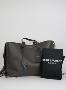 Saint Laurent Shopper in pelle grigia con frange laterali
