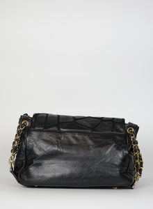 Chanel Black paved effect leather bag