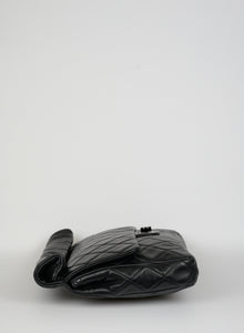 Chanel Roll Up Maxi Clutch in pelle matelassé nera