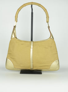 Gucci Jackie bag in gold fabric
