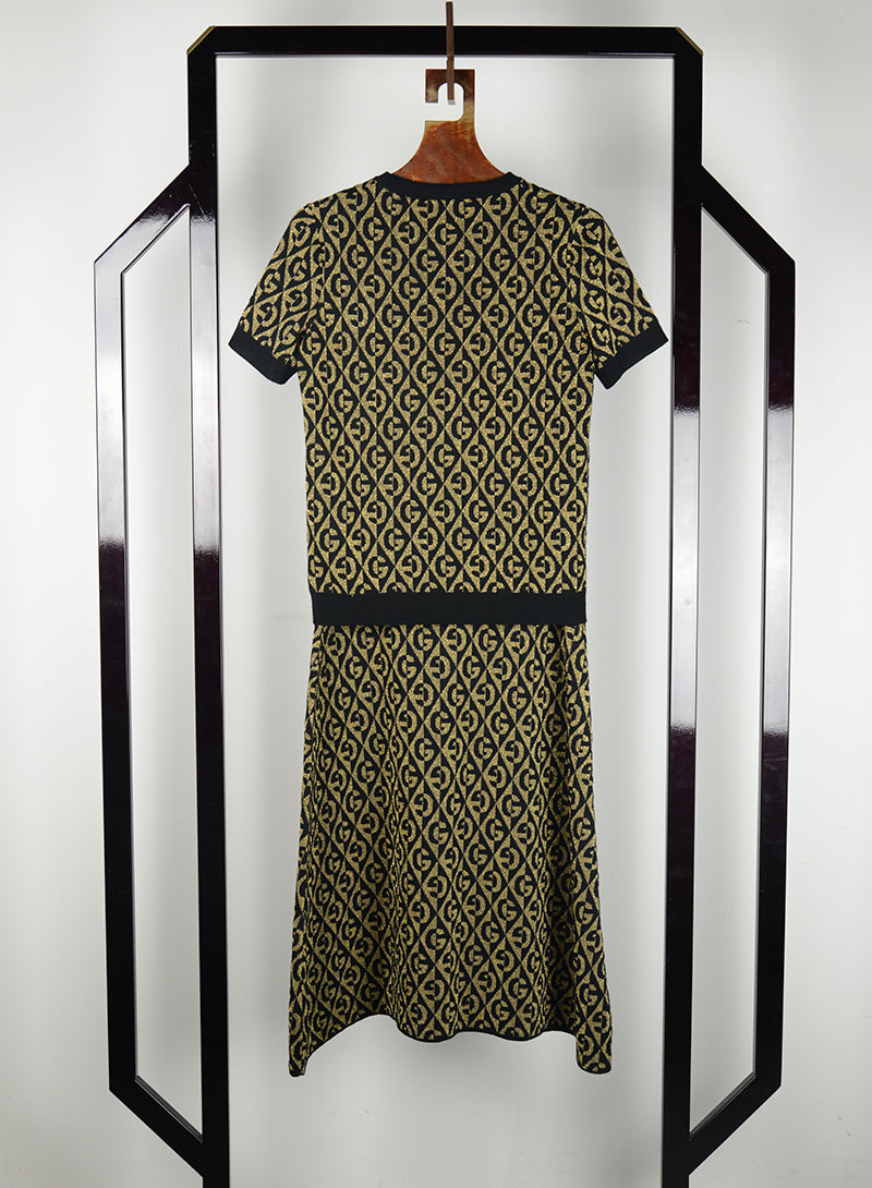 Gucci Black and gold pullover and skirt suit with GG - Size. S