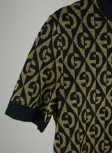 Load image into Gallery viewer, Gucci Black and gold pullover and skirt suit with GG - Size. S
