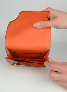 Hermès Orange Roulis slim leather wallet
