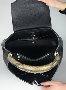 Louis Vuitton Capucine bag in black leather
