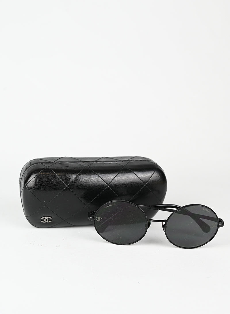 Chanel Occhiali tondi neri