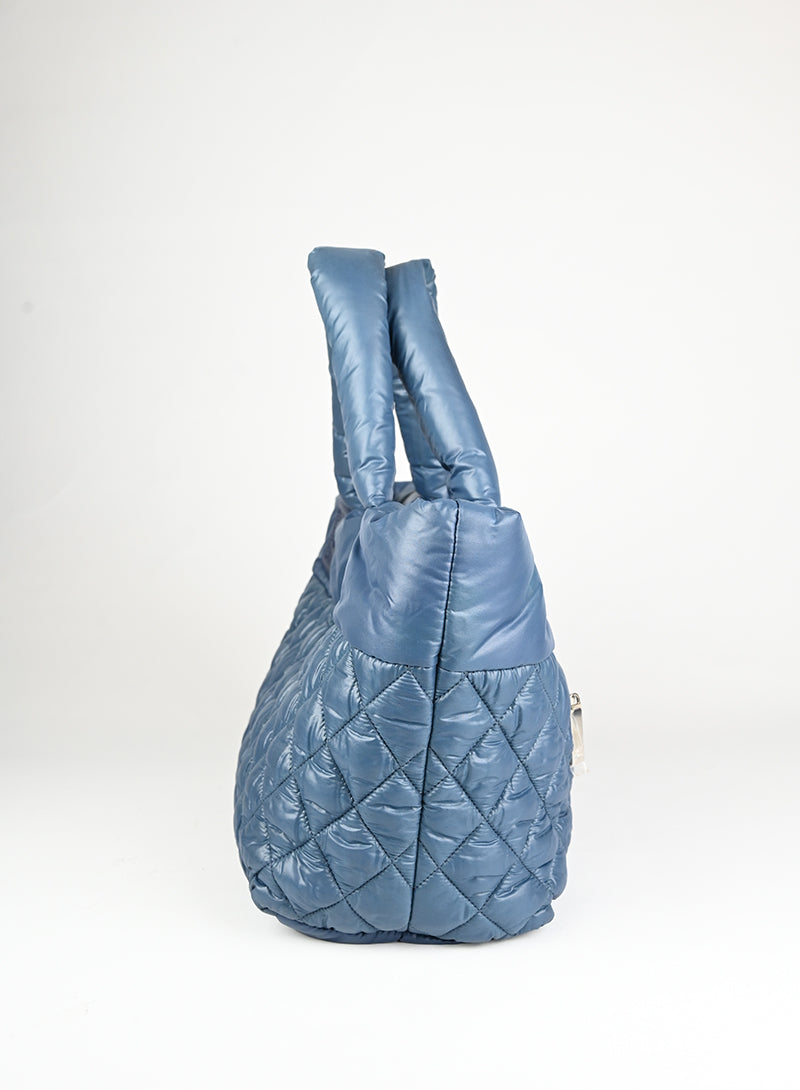 Chanel Borsa Cocoon media in tessuto petrolio