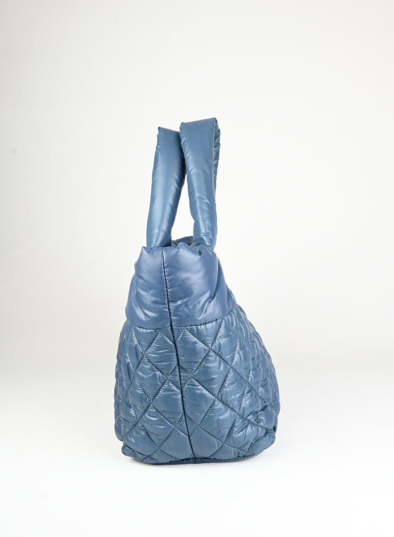 Chanel Borsa Cocoon media in tessuto petrolio