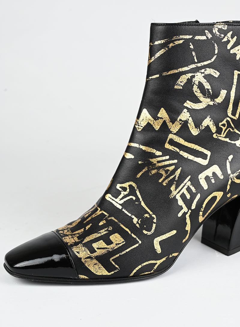 Chanel Stivaletti in pelle nera e oro - N. 37