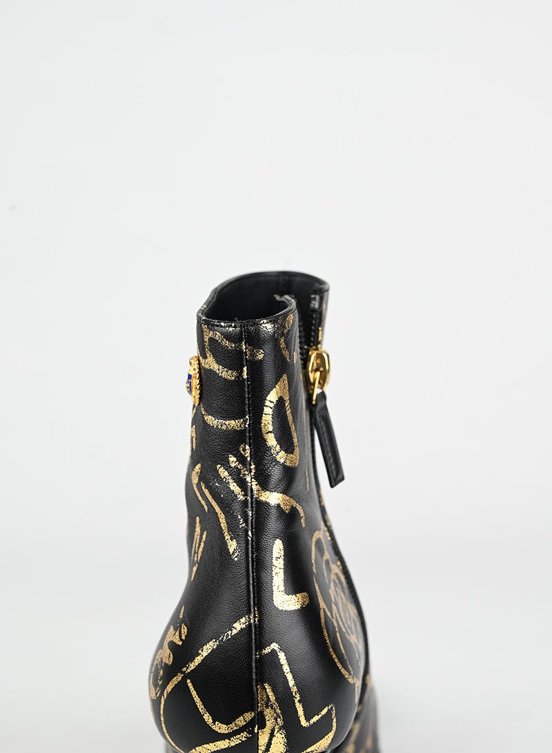 Chanel Stivaletti in pelle nera e oro - N. 37