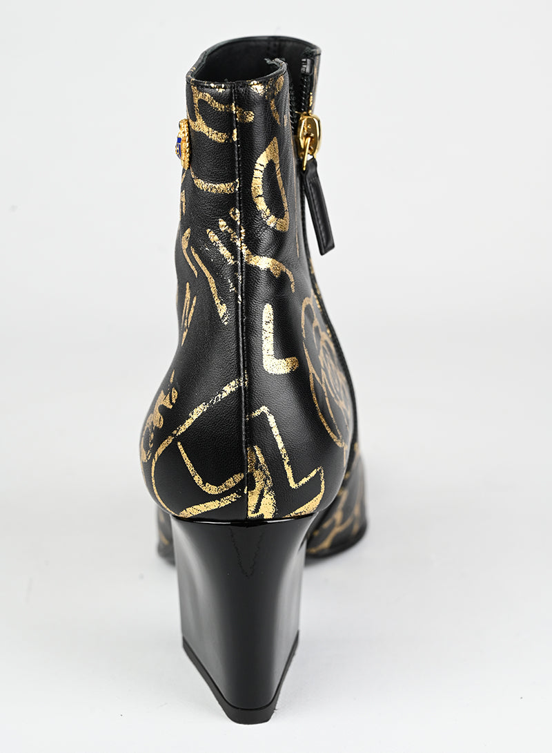 Chanel Stivaletti in pelle nera e oro - N. 37