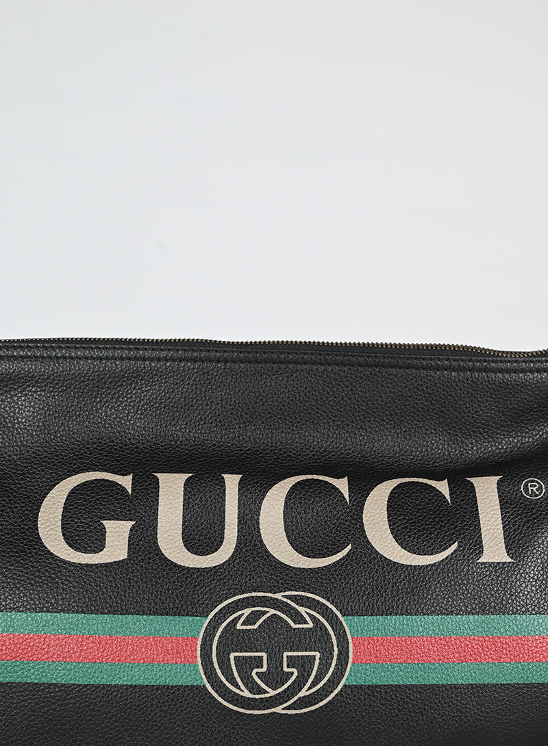 Gucci Pochette in pelle nera con logo