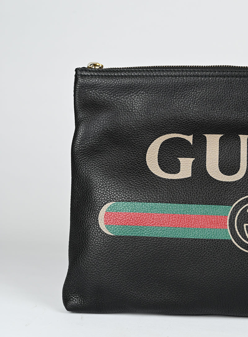 Gucci Pochette in pelle nera con logo