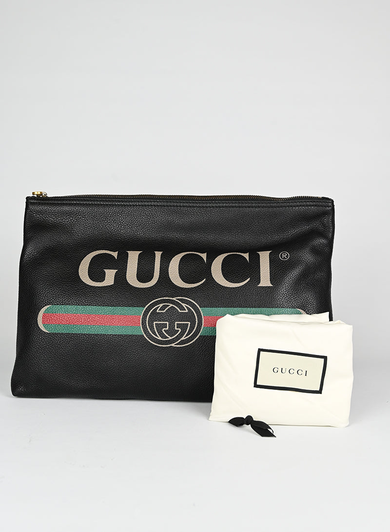 Gucci Pochette in pelle nera con logo