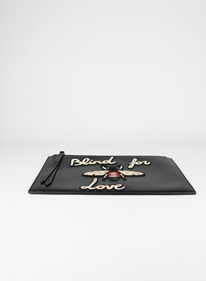 Gucci Pochette con ape in pelle nera