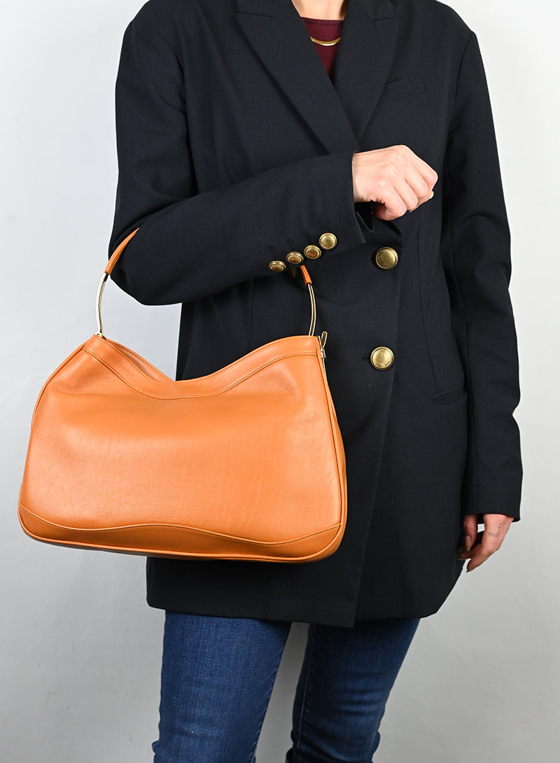 Versace Borsa semi hobo in pelle arancio -  lesleyluxuryvintage