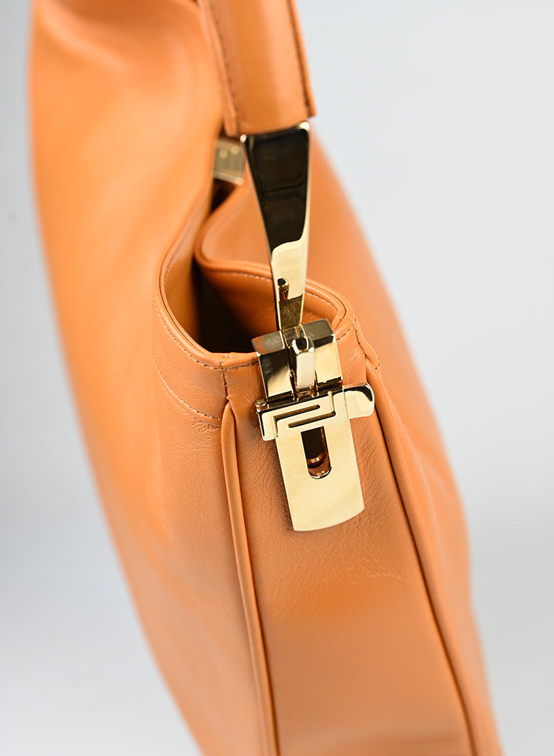 Versace Borsa semi hobo in pelle arancio -  lesleyluxuryvintage