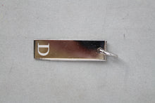 Load image into Gallery viewer, Dior Ciondolo placchette argentate con logo
